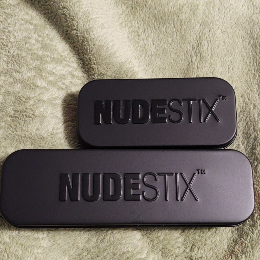Two empty Nudestix boxes